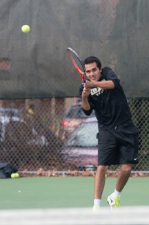Philip Vukelich | Argonaut Cesar Torres follows through with a backhand shot during practice Monday at the Memorial Gym tennis courts. Idaho hosts UTSA and Denver Friday and Sunday respectively. With a pair of wins, the Vandals can win the WAC regular season title outright. 