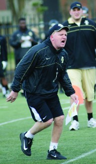 File photo by Theo Lawson | Argonaut Coach Paul Petrino yells at his team during Idaho's first spring practice March 22 at the SprinTurf. Petrino will face his first test as a collegiate head coach Saturday in Denton, Texas, when the Vandals visit North Texas. 