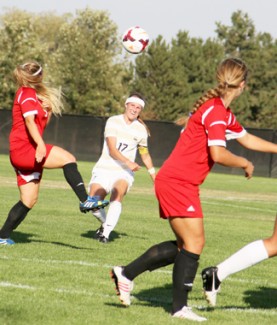 Steven Devine | Argonaut Midfielder Katie Baran passes the ball through heavy defense during Friday's game against Eastern Washington. The Vandals came up short with a 2-1 loss and will face Grand Canyon 1 p.m. on Sunday at Guy Wicks Field.