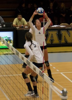 Abi Stomberg | Argonaut Sophomore Meredith Coba sets the ball Thursday during Idaho's match against Utah Valley in Memorial Gym. The Vandals lost 3-2 in their WAC home opener.