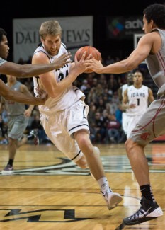 File Photo by Tony Marcolina | Argonaut Idaho forward Stephen Madison drives past defenders during the Dec. 7 game against Washington State in the Cowan Spectrum. The Vandals lost Wednesday at Montana 69-58.