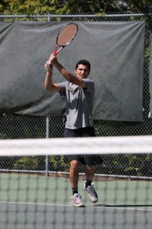 Parker Wilson | Argonaut Assistant coach Abid Akbar practices with the women's tennis team at the Memorial Gym tennis courts in preparation for its NCAA tournament match on Friday.