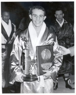 Frank Echevarria holds his national championship trophy and the LaRowe Trophy, which was given annually to the nation's best boxer. Echevarria now lives in Blackfoot, Idaho. Courtesy | UI