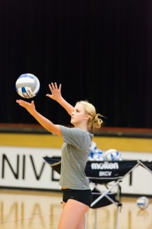 Philip Vukelich | Argonaut Sophomore defensive specialist Terra Varney tosses the ball for a serve during practice Monday in Memorial Gym. The Vandals open the season Friday at Florida for the Active Ankle Challenge. They play Oklahoma and Florida Friday and Georgia Southern Saturday.