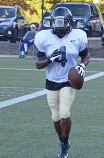 Nathan Romans | Argonaut Sophomore running back Richard Montgomery jogs along the sideline after a big run during Tuesday's practice. Montgomery and the Vandals open the season Saturday at Florida.