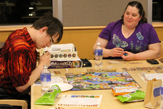 Ian Bartlett  | Rawr Strategy and Games, a local game store in Moscow, brought board and card games, such as Magic: the Gathering, Cards Against Humanity, and Smallworld, for students to try at Vandal Game Overnight.