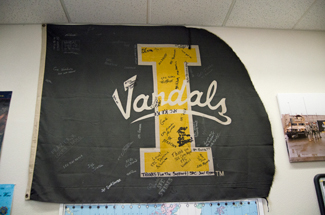Nathan Romans | Argonaut A University of Idaho Flag that spent time in Afghanistan hangs on the wall of the Veterans Assistance Office.
