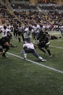 Senior running back Jerrel Brown attempts to juke a Troy defender in Idaho's 34-17 loss to Troy Saturday in the Kibbie Dome. The Vandals take the field one last time Nov. 29 at Appalachian State.   