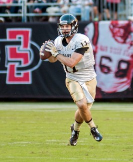 Ilya Pinchuk | Idaho Athletic Department Idaho quarterback Chad Chalich runs the ball at the San Diego State game. 