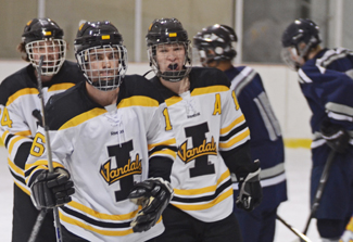 Nathan Romans |Argonaut Idaho players celebrate their second goal of the game during Idaho's 6-5 loss against Western Washington Friday at Palouse Ice Rink in Moscow.