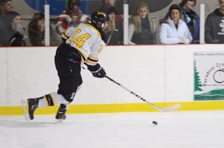 Nathan Romans | Argonaut Defender Erik Miller moves down the ice during Idaho's 6-5 loss against Western Washington Friday at Palouse Ice Rink in Moscow