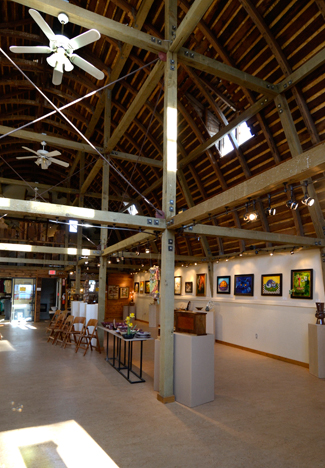 Amelia C. Warden | Rawr An overview shot of the main gallery at the Dahmen Barn located in Uniontown, Washington. The Dahmen Barn houses several artisan studios and holds several classes in various mediums.