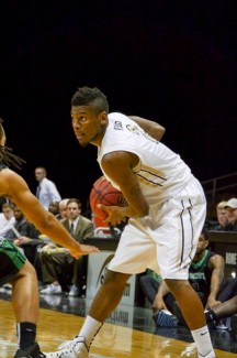 Sophomore guard Sekou Wiggs examines the defense during Idaho's 71-63 loss Thursday in the Cowan Spectrum. The loss brought Idaho's losing streak to four games.