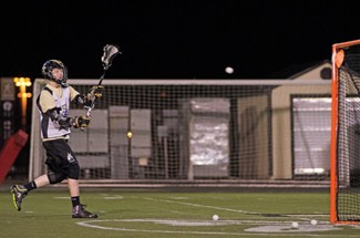 Nathan Romans | Argonaut Junior attacker Blake Batman tosses a shot into the net during practice Wednesday at the SprinTurf fields. Idaho plays Oregon State Saturday at 12:30 p.m. at the SprinTurf.