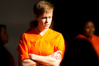 Nathan Romans | Argonaut Courtney Kersten performs during "Any One of Us: Words from Prison" presented by the University of Idaho Women's Center Friday in the International Ballroom in the Bruce Pitman Center, formerly the Student Union Building.