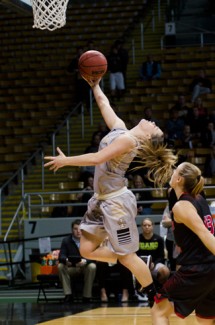 Nathan Romans | Argonaut Senior guard Stacey Barr is fouled as she scores during Idaho's 71-58 win over Eastern Washington University Saturday in the Cowan Spectrum. Barr finished with 30 points, eight rebounds and three steals in the win.