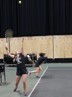 Daphne Jackson | Argonaut Belen Barcenilla (left) and Lucia Badillos practice serving Wednesday.