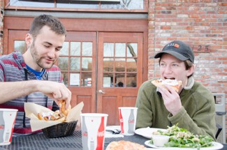 Jackson Flynn | Argonaut Seniors Jimmy Mueller, left, and Forrest Walker, right, enjoy a meal at the newly opened Last Frontier Pizza Company. It is located at 125 East 2nd St. in Moscow.