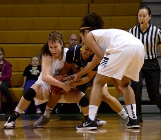 Amelia C. Warden | Argonaut Idaho fights for a jump ball during the game against Northern Arizona at the Cowan Spectrum on Thursday night. Idaho won 78-43.