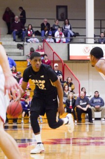 Jay Anderson | Argonaut Senior point guard Mike Scott drives past a defender during Idaho's 98-95 overtime loss to Eastern Washington Saturday in Cheney, Washington. Scott's final shot was blocked by EWU as time expired in overtime.