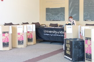 Daphne Jackson | Argonaut Rebecca Hall, a member of the Horse Polo Team, volunteers at the first day of the CALS food drive Monday in the Ag Biotech building. The food drive will continue until Friday.