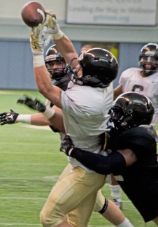 Nathan Romans | Argonaut Sophomore wide receiver David Ungerer drops a catch during practice Saturday in the Kibbie Dome.