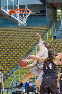 Nathan Romans | Argonaut Junior post Renae Mokrzycki fights through defenders during Idaho's 77-53 win against Idaho State Saturday in the Cowan Spectrum.