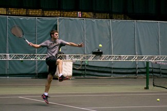 Idaho junior Odon Barta jumps to return the ball at practice Feb. 18 in the Kibbie Dome.