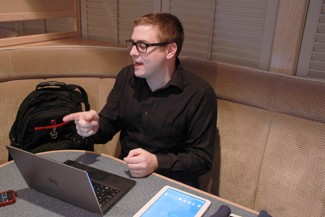 YIshan Chen | Argonaut Kely Strid, owner of the delivery service company, describes his company Tuesday. Friday is the company's first day of deliveries.