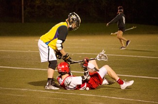 Nathan Romans | Argonaut Senior midfielder Patrick Tunison, left, and freshman defensive middle Steven Greene fight for the ball during practice Wednesday night at the SprinTurf. The Vandals play Montana at 1 p.m. Saturday in Missoula.
