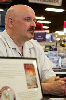 Nathan Romans | Argonaut  Al Halsey, author of "Mists of the Miskatonic" and "Hellgate, Montana" sits at a book signing table Saturday in the Moscow Hastings.