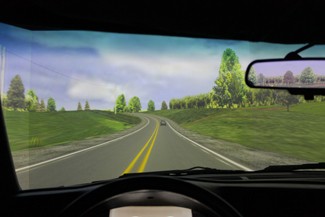 Daphne Jackson | Argonaut The driving simulator has mulitple displays and uses the cab of a truck to make the simulation feel as real as possible.