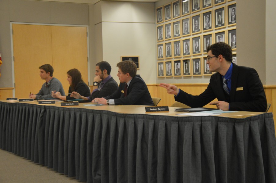 ASUI Senator Zachary Spence speaks at the ASUI meeting Wednesday. The ASUI senate amended a bill regarding spring election campaigning length.