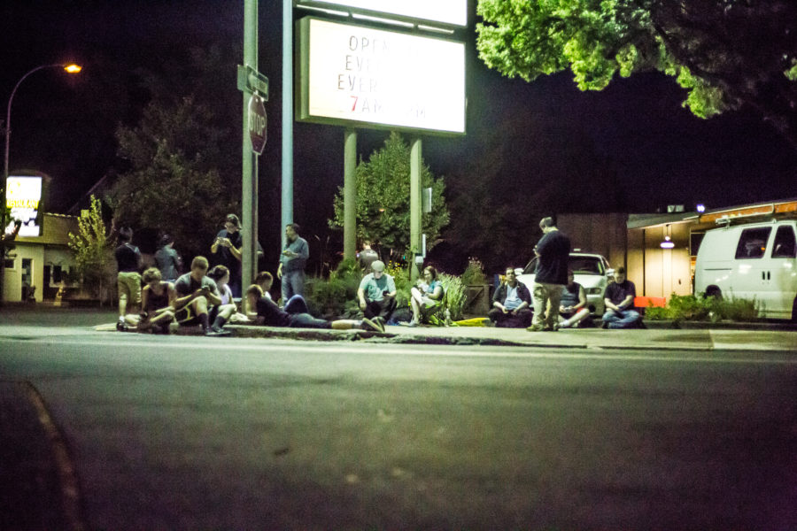 Nick Eastman-Pratt | Argonaut Citizens of Moscow, who are players of the app Pokemon Go, gather around a corner in order to visit Pokestops.
