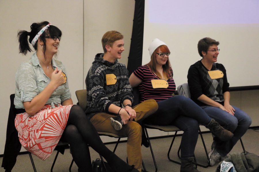 Panelists Madeline Scyphers, Mars Cantrell, Jacey Hjaltelin and Autrey Jeske laugh while responding to questions during the Sexual Orientation Game Show in the Commons Whitewater Room on Tuesday.