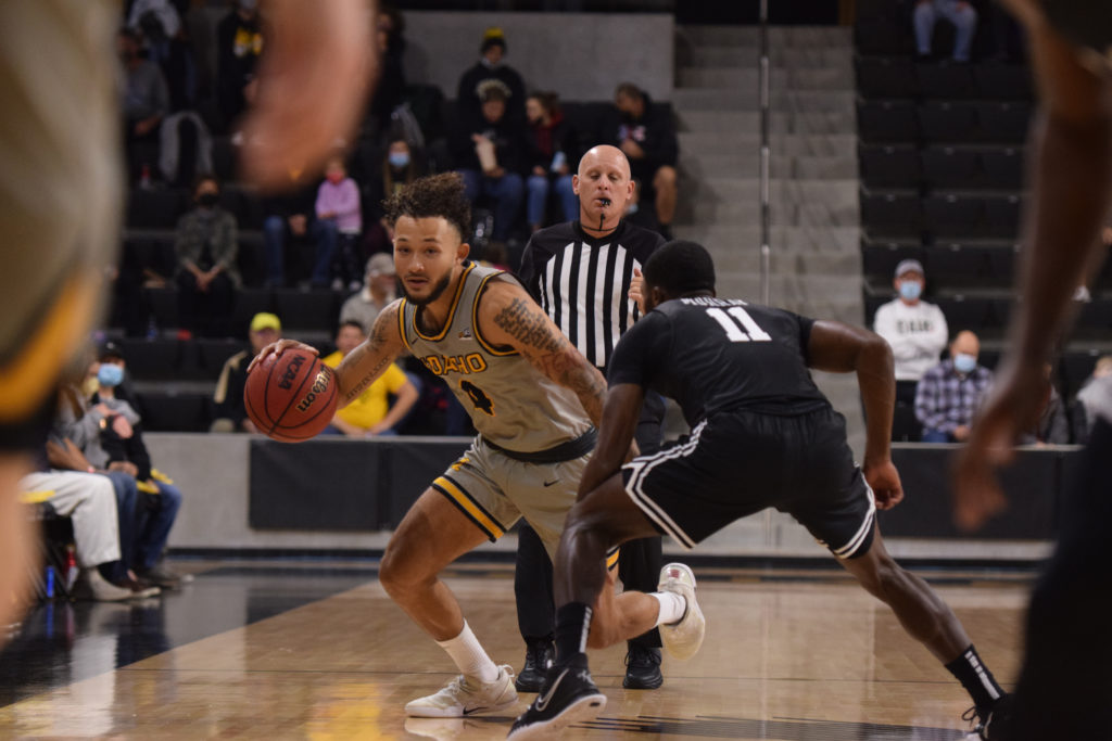 Junior guard Trevante Anderson drives toward the hoop while guarded by a Long Beach player on Nov. 10 in the ICCU Arena. Saydee Brass | Argonaut