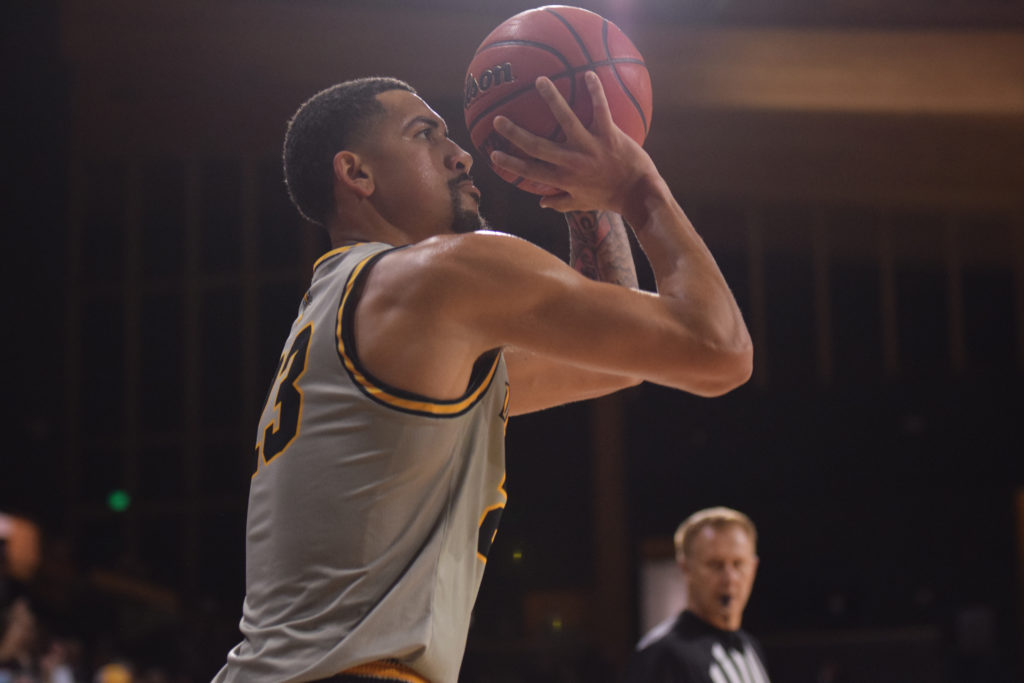 Junior guard Rashad Smith prepares to fire a shot up during the Long Beach game on Nov. 10 in the ICCU Arena. Saydee Brass | Argonaut