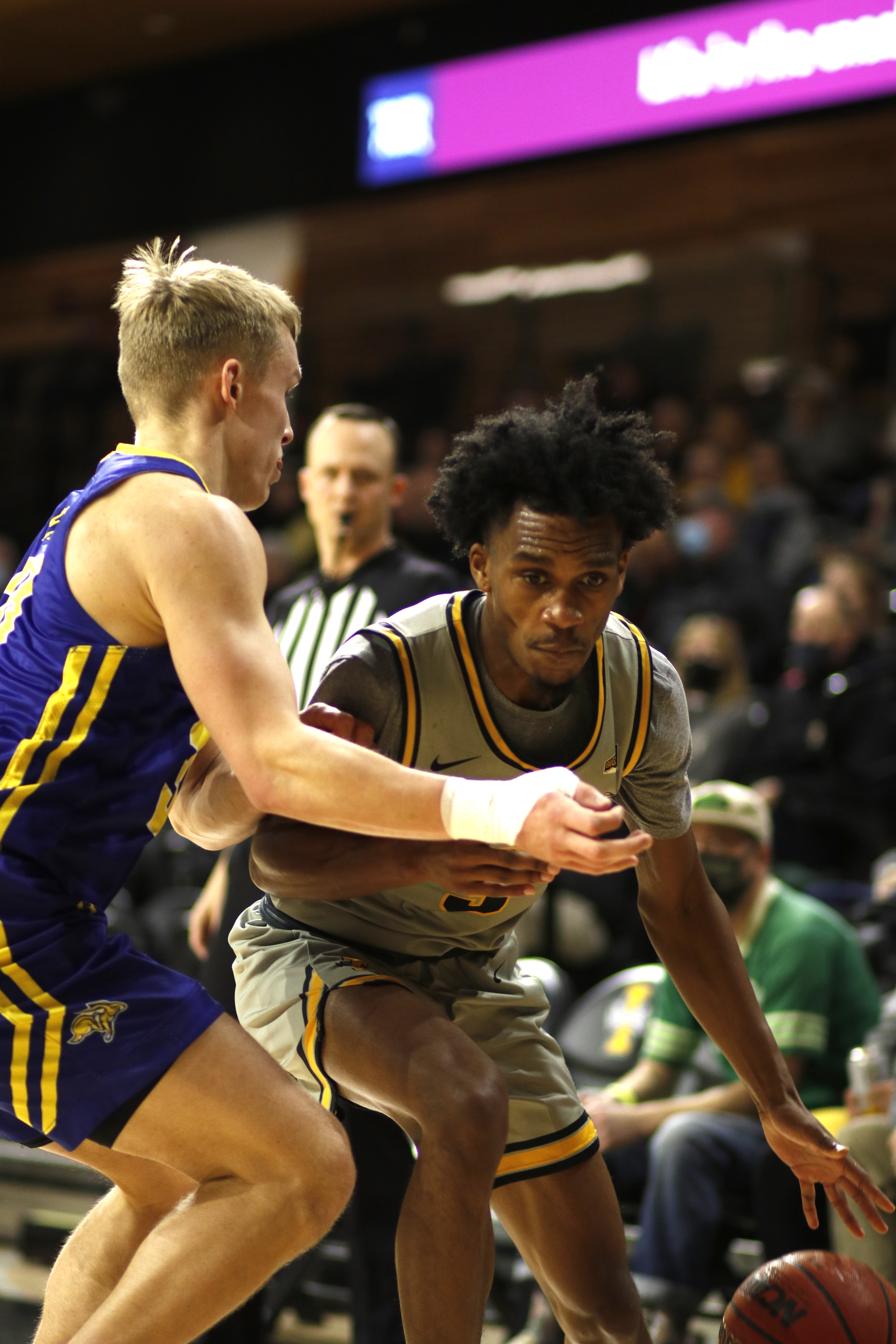Senior guard Mikey Dixon drives to the hoop while being guarded by a South Dakota State player on Dec. 8 at the ICCU Arena. Saydee Brass | Argonaut