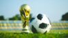 Soccer ball sits next to 2018 World Cup trophy | Fauzan Saari| Unsplash